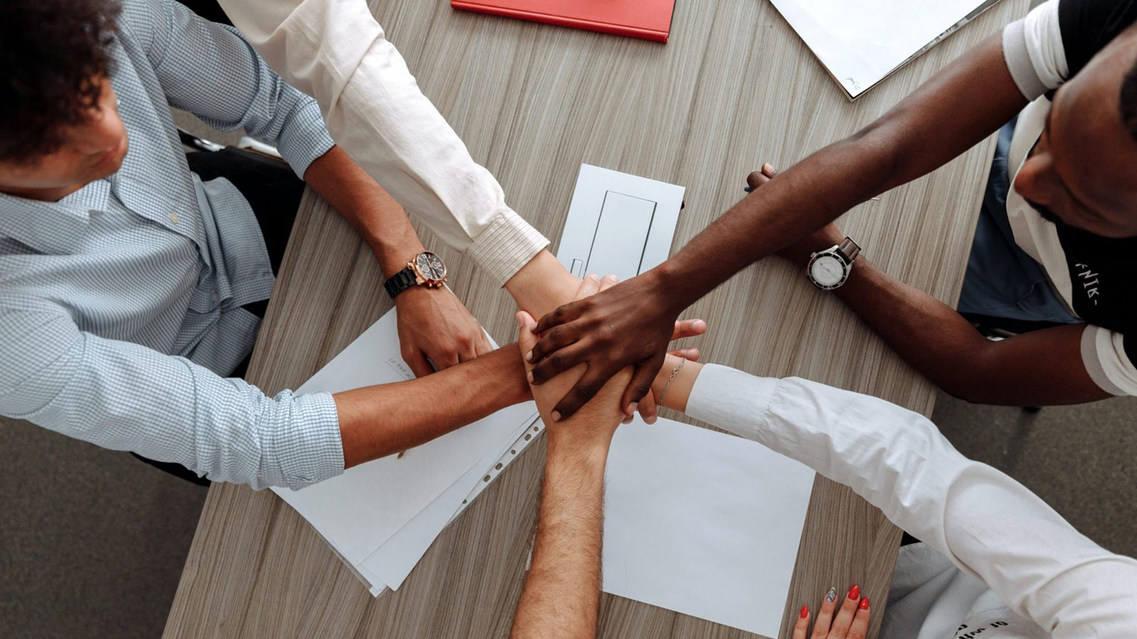 hands placed on top of each other