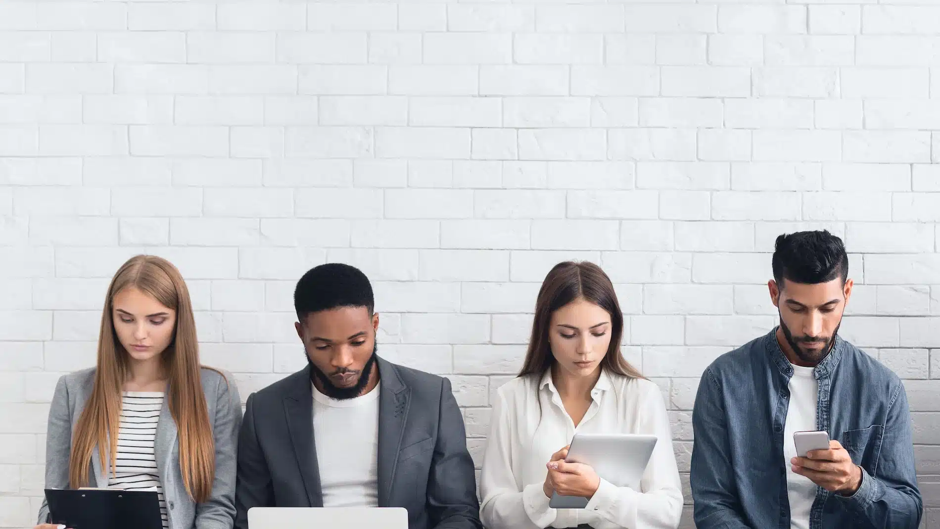 People looking at electronic devices